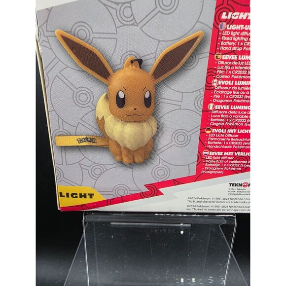 Pokémon Light-Up Eevee Figure With Hand Strap & LED Diffuser 4 Inch Collectible - Picture 8 of 8